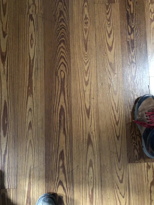 Close-up of amber heart pine planks with bold cathedral grain
